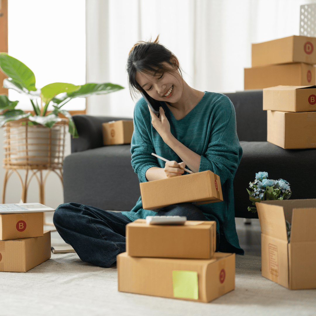 Smiling Small Business Owner Pays Supplier