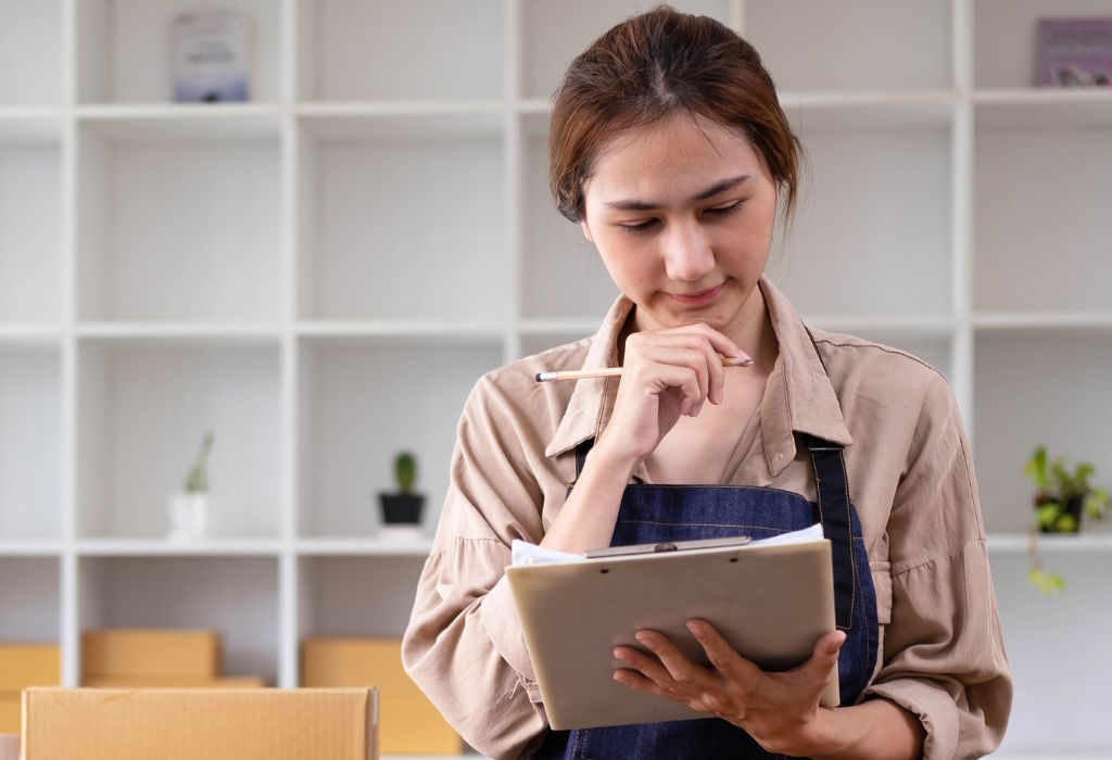 Woman Analyzing Business Finances